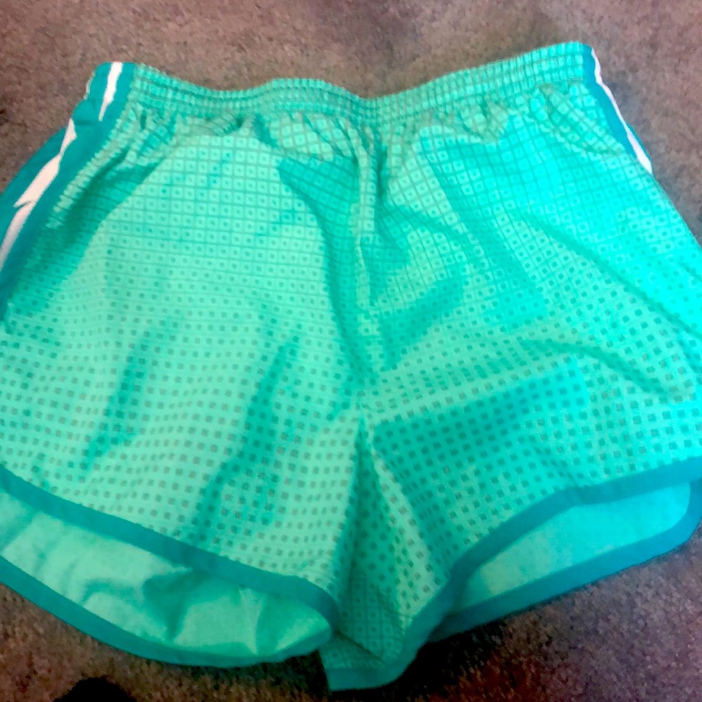 Green Nike shorts